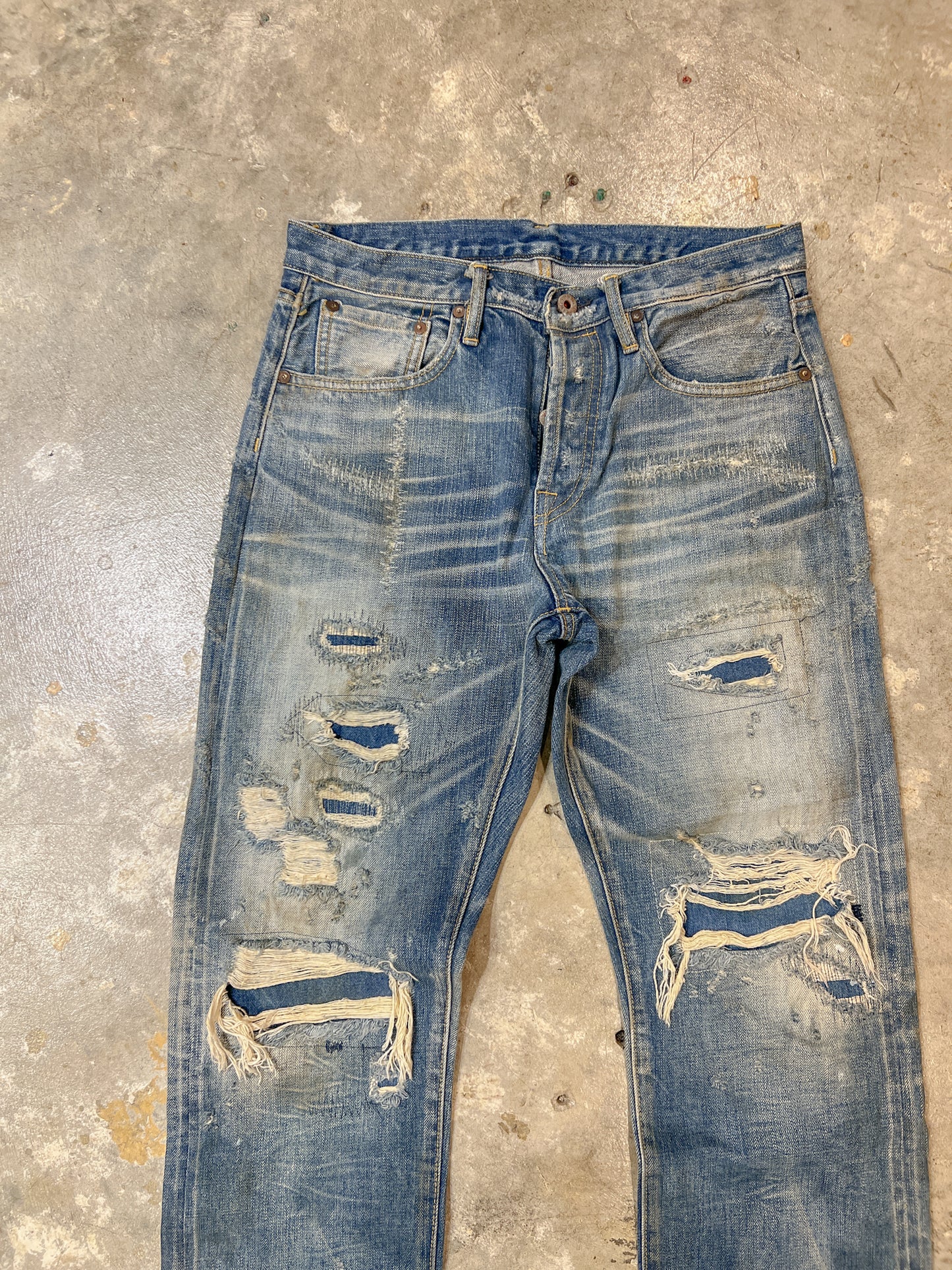 F05 Damaged Crushing Denim Jeans